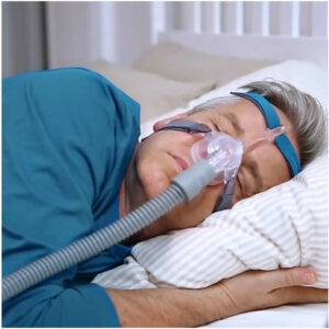 Barbat dormind cu Masca CPAP Nazala Cara, Lowenstein